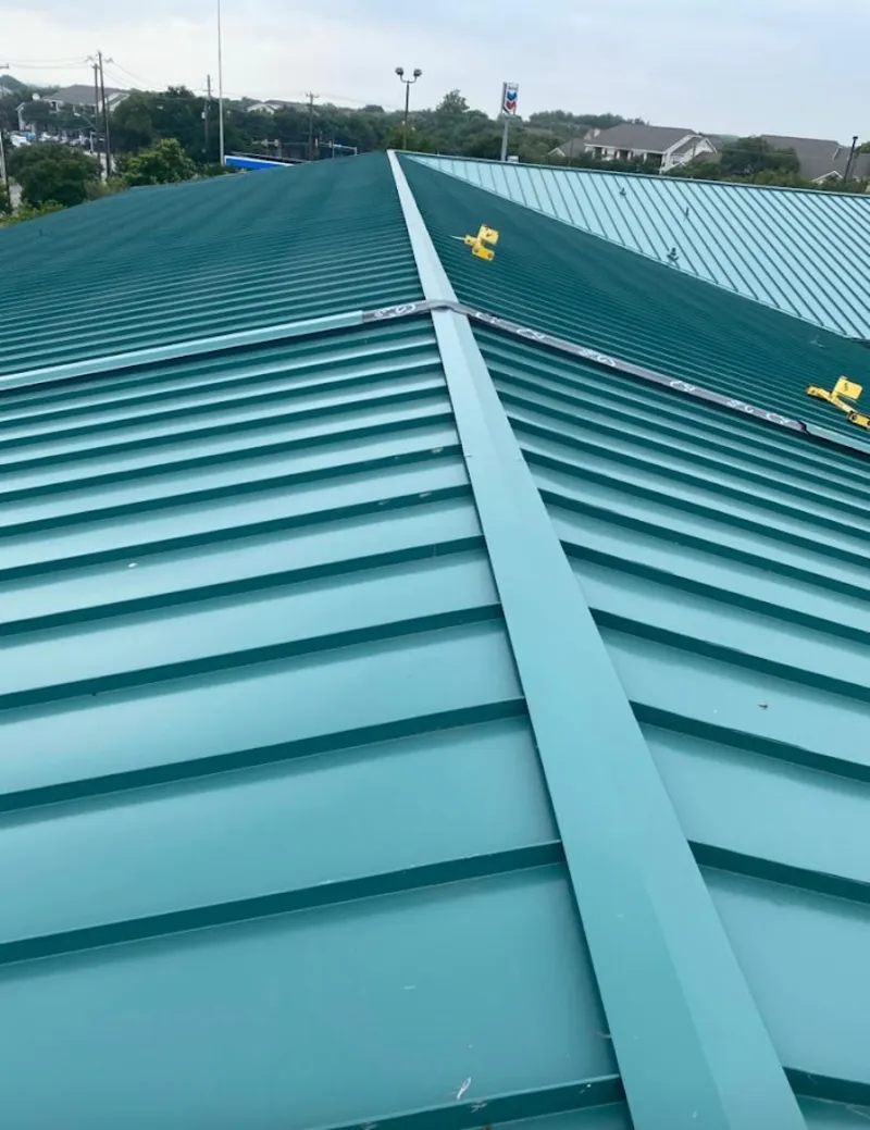 Green commercial metal roof ridge and valley for Metal Roof Repair in Leoni